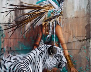 Close up of Sonny Street Art Mural of girl and white tiger painted in the streets of Ireland for Waterford Walls Festival 2018